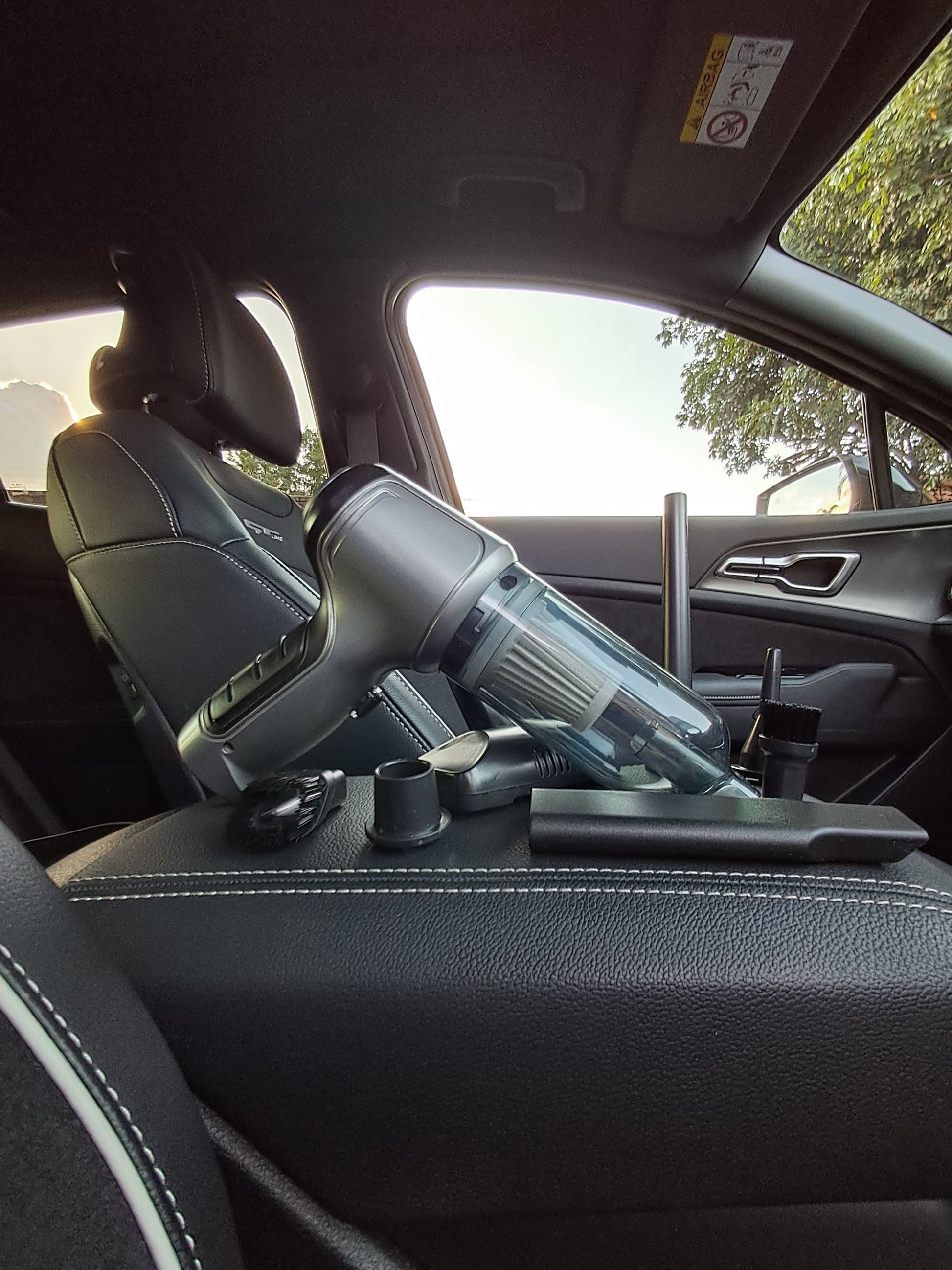 Car interior with a vaccum on the centre console